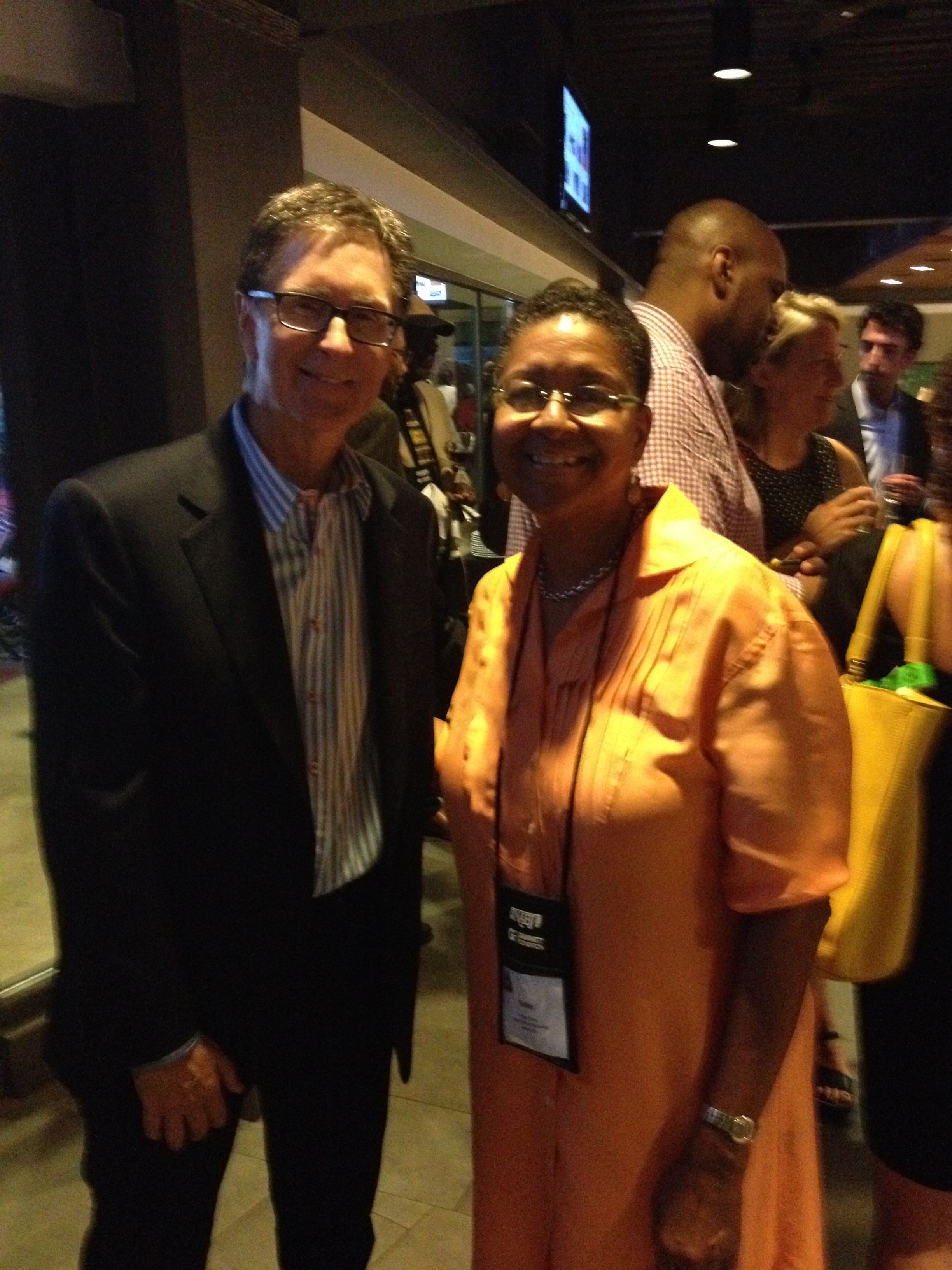 Kelley Chunn with John Henry, owner of the Boston Red Sox and The Boston Globe, at a Fenway Park reception for the National Association of Black Journalists Convention.